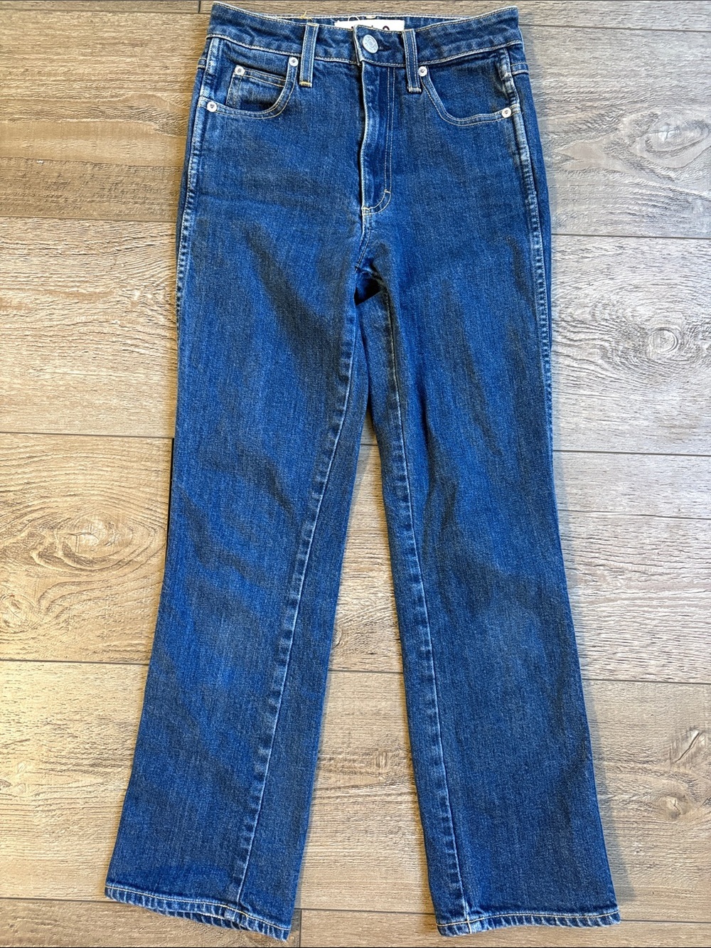 AMO Denim Bella High Waisted Cropped Flare Medium Wash Jeans in Indie Blue